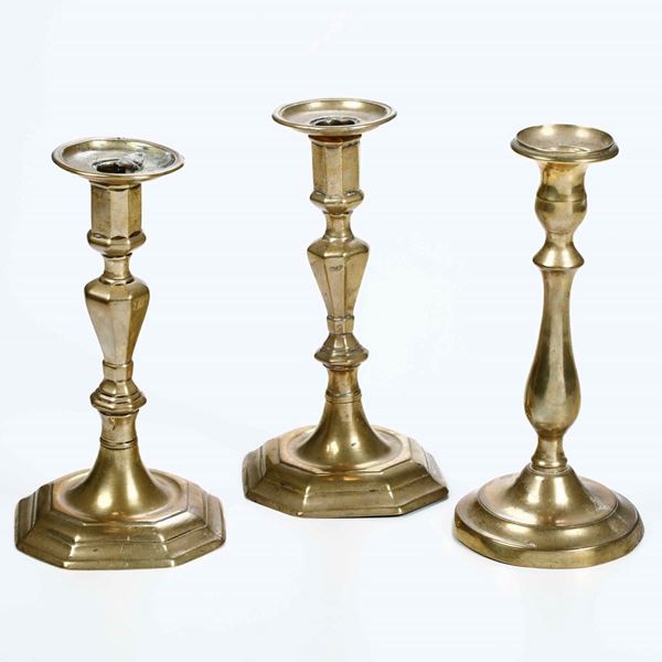 Lotto di tre candelieri in bronzo dorato, XVIII - XIX secolo