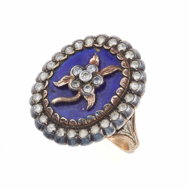 Diamond, blue glass, gold and silver ring