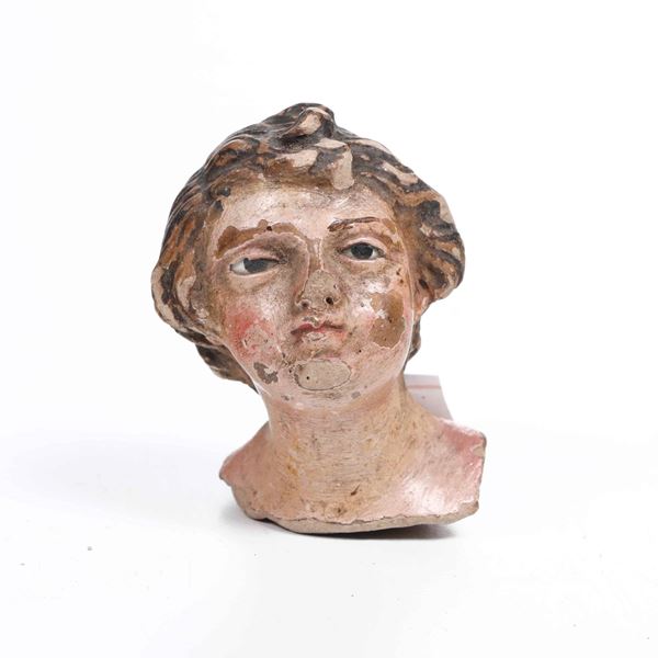 Fanciullo. Testa per statuina da presepe in terracotta. Napoli XIX secolo