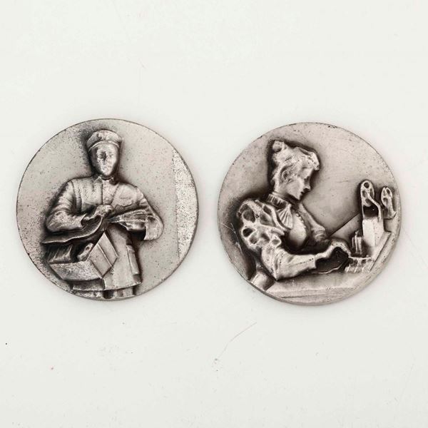 Coppia di medaglie in argento 800. XX secolo