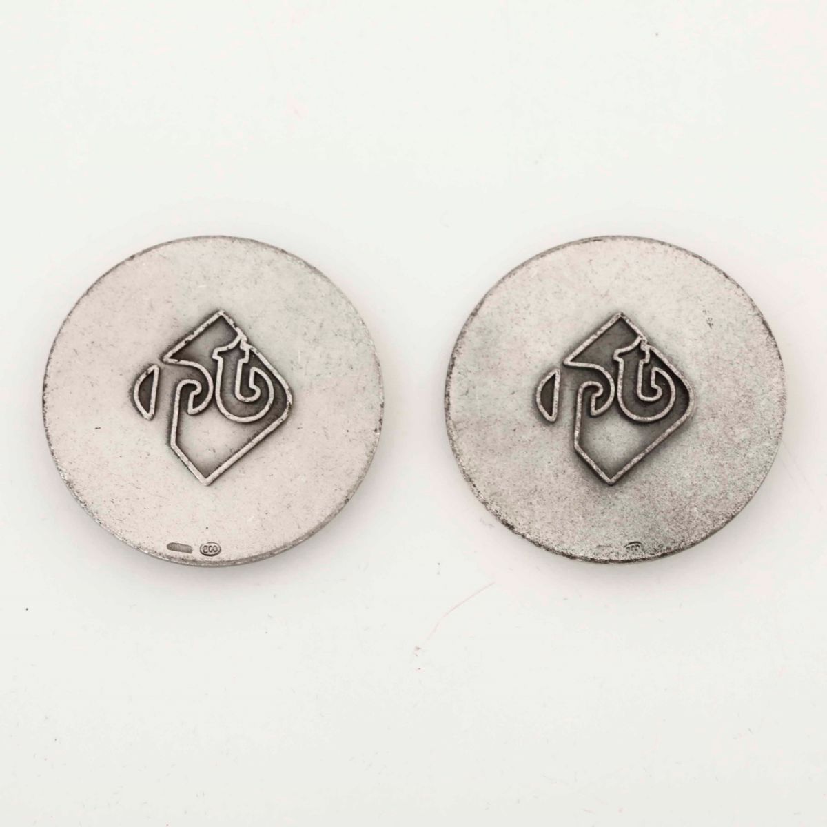 Coppia di Medaglie in Argento 800. XX Secolo
