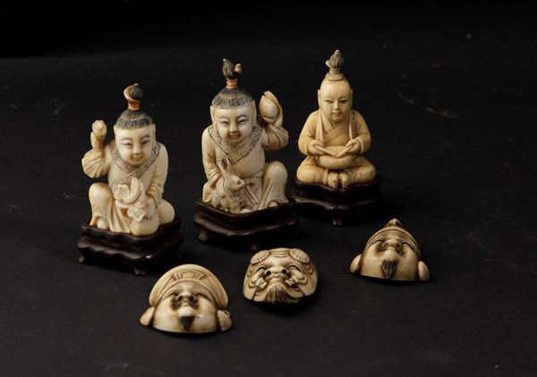 Lotto composto da tre maschere e tre piccole figure in avorio, Cina, inizio XX secolo