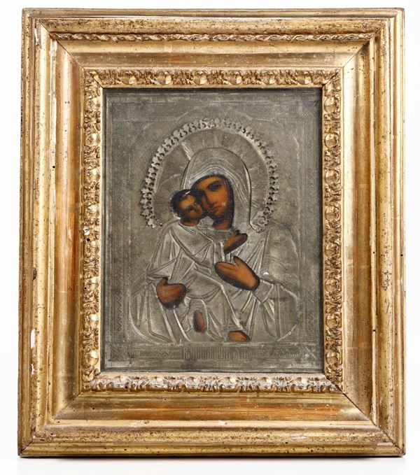 Vergine di Vladimir Icona su tavola con riza in metallo e cornice in legno intagliato e dorato. (non pertinente) Scuola russa, XIX secolo La Vergine di Vladimir