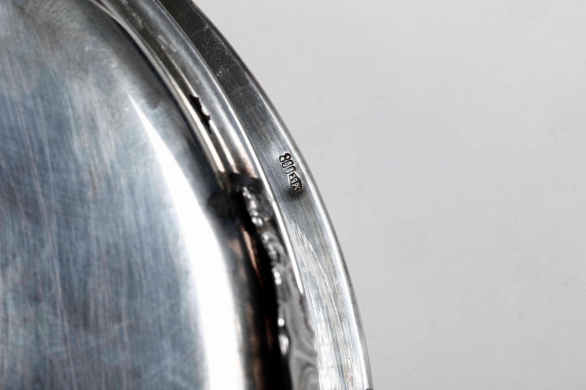 Due Cestini ed un Porta Essenze in Argento. Argenteria Italiana del XX Secolo