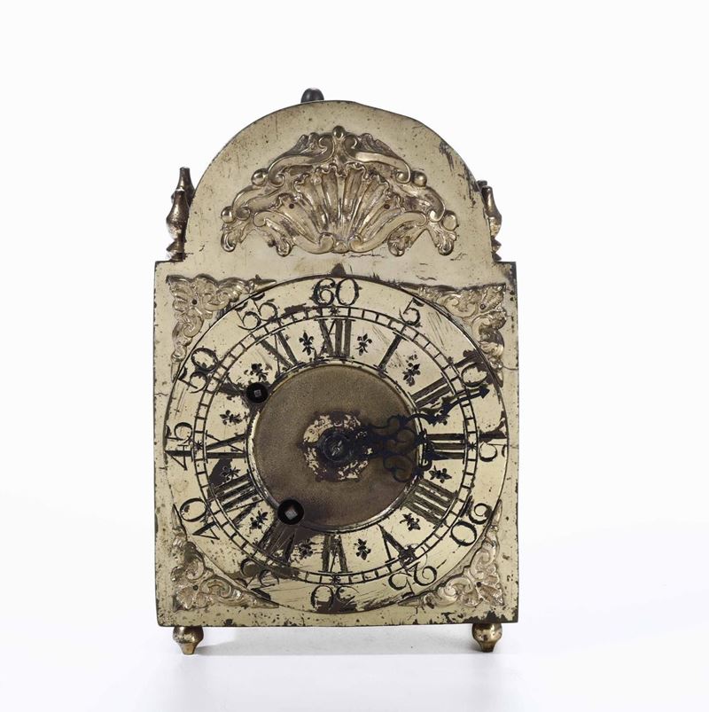 Orologio a lanterna in metallo dorato con decori a rilievo. XVIII secolo  - Auction Antiques | Time Auction - Cambi Casa d'Aste
