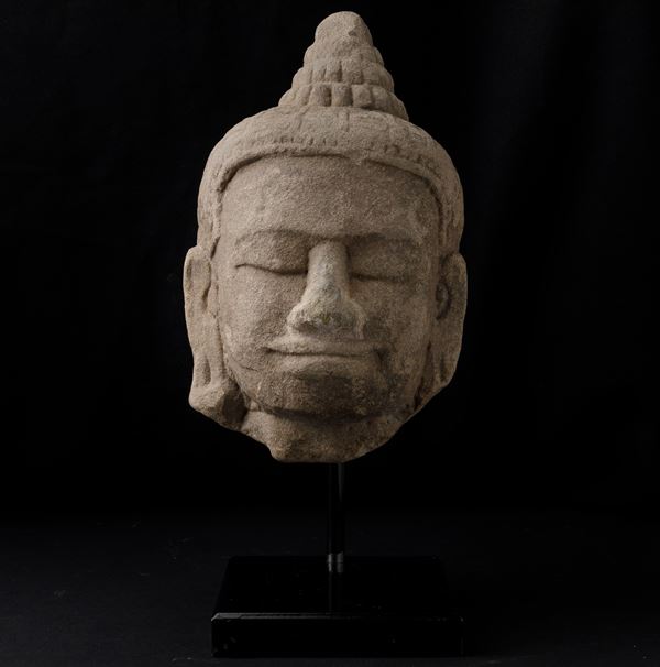 A stone Buddha head, Khmer, 1200s
