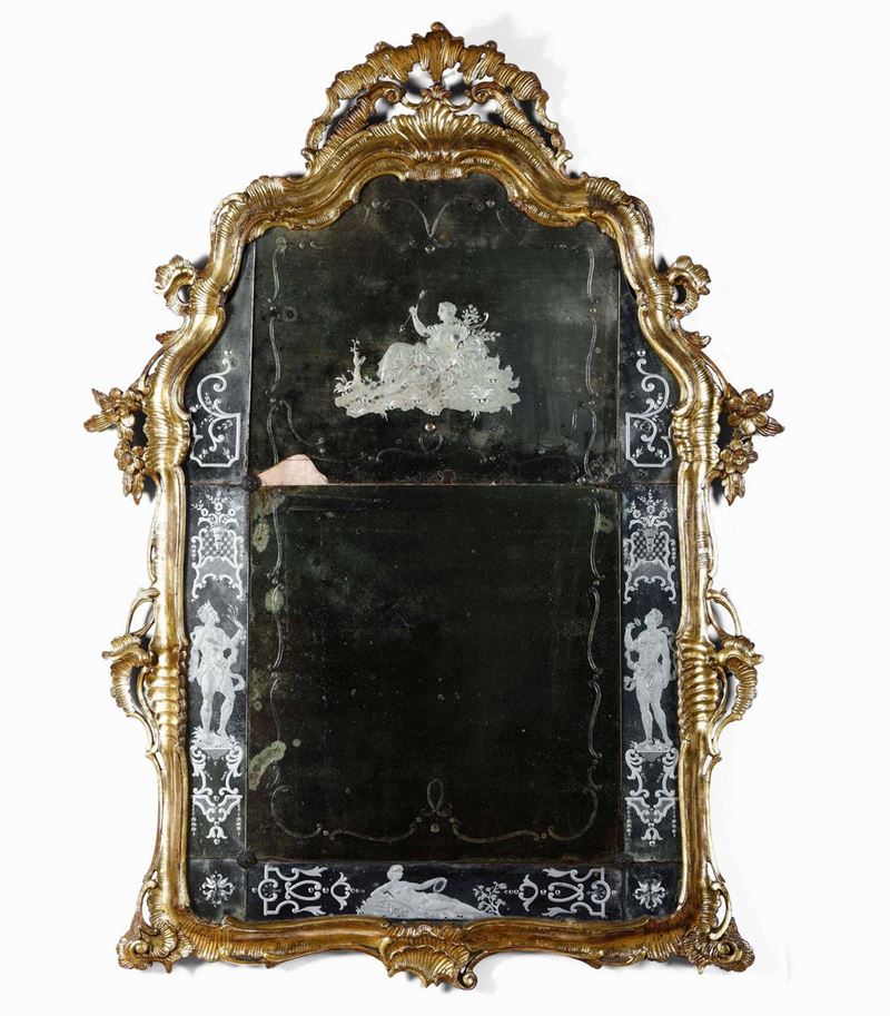 Grande specchiera in legno scolpito e dorato, specchio inciso, Venezia XVIII-XIX secolo  - Asta Villa Bucci-Errani in Faenza - Cambi Casa d'Aste