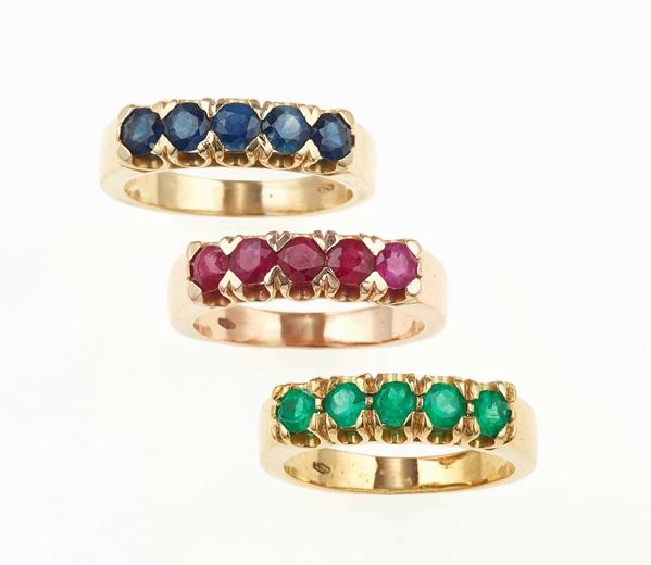 Three emerald, ruby and sapphire rings