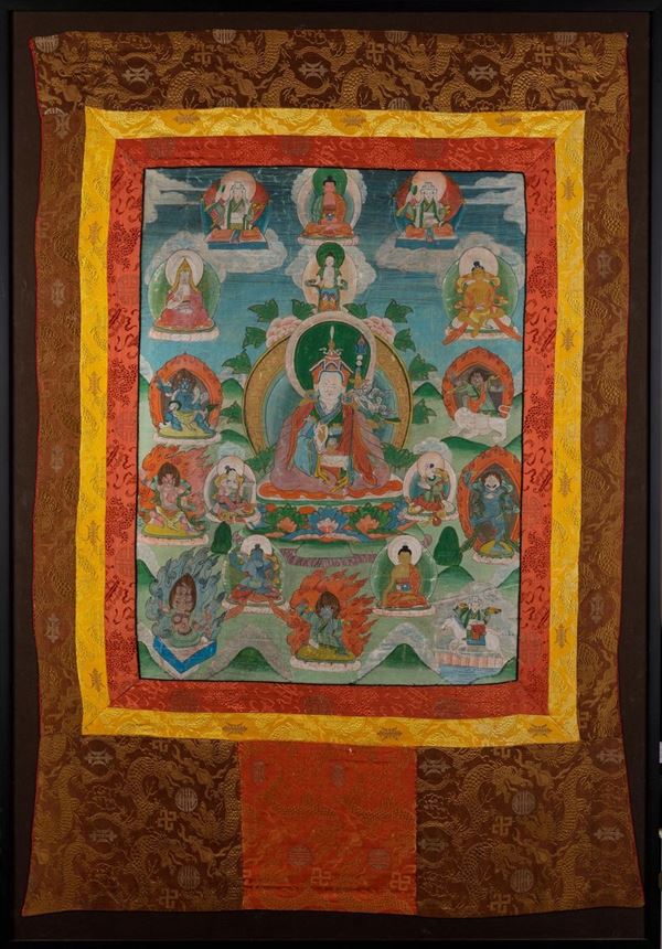 Thangka su seta raffigurante figura di Padmasamblava e altre divinità, Tibet, inizi XIX secolo