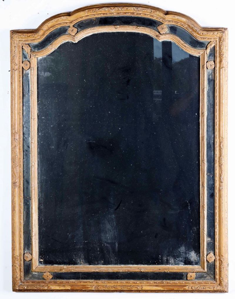 Specchiera in legno intagliato. XIX secolo  - Asta Antiquariato Gennaio | Cambi Time - I - Cambi Casa d'Aste