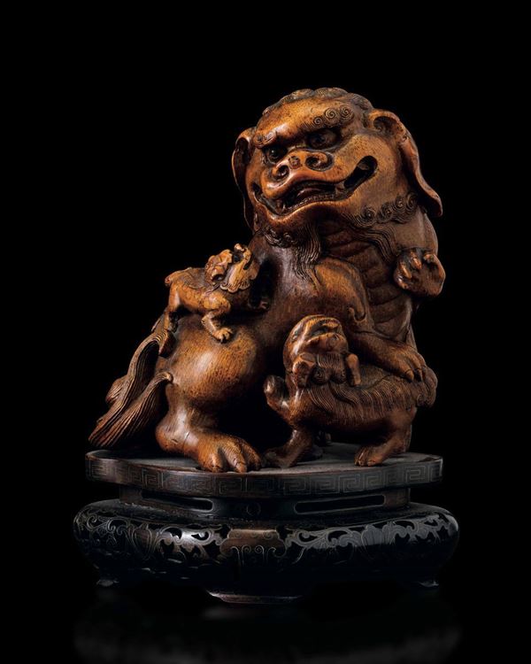 A carved wood group, China, Qing Dynasty