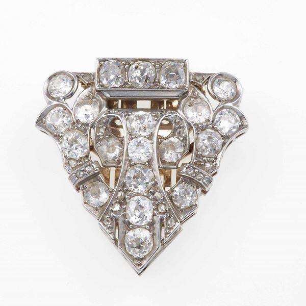 Old-cut diamond, platinum and gold clip. Fitted case
