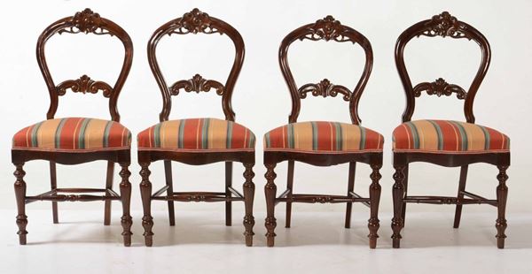 Quattro sedie in legno intagliato, fine XIX secolo