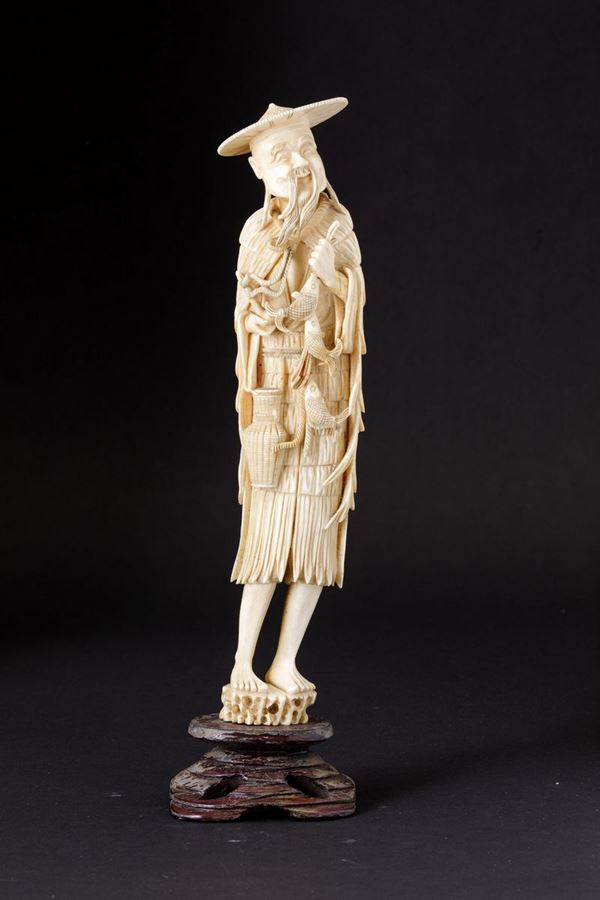 A carved ivory figure, China, early 1900s