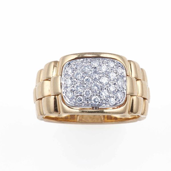 Diamond and gold ring. Signed Damiani