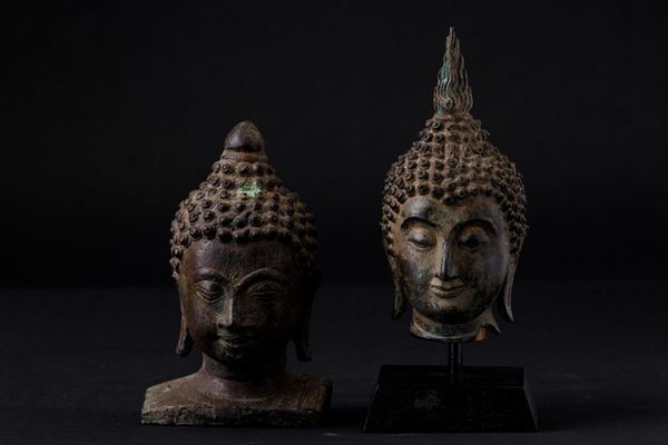 Due teste di Buddha in bronzo, Thailandia, XIX secolo
