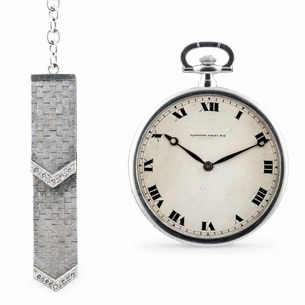 AUDEMARS PIGUET -  Elegante orologio ultrapiatto da tasca in platino e diamanti, con astuccio originale e chatelaine in oro bianco e brillanti