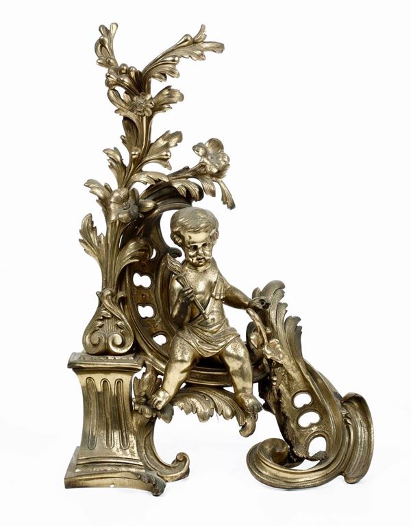 Alare in bronzo dorato con putto. XVIII secolo