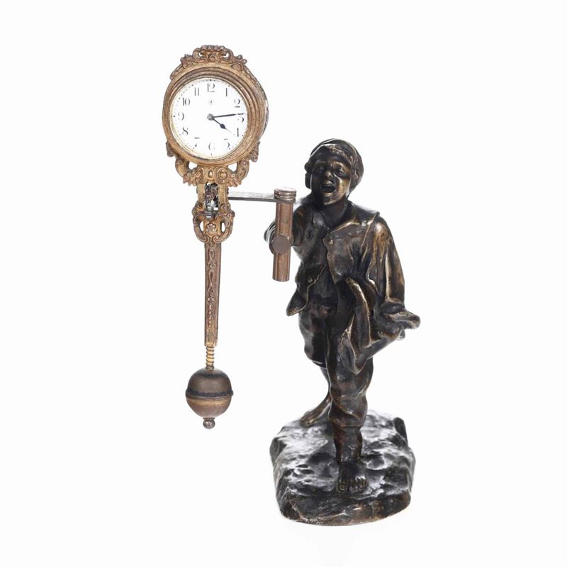 Orologio in bronzo patinato e metallo dorato. Italia 1930-1940  - Auction Antique April | Cambi Time - Cambi Casa d'Aste