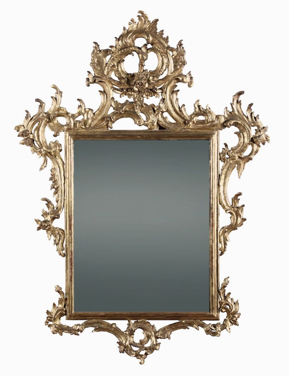 Specchiera con cornice in legno intagliato e dorato in stile barocco.  Veneto XX secolo - Auction Fine