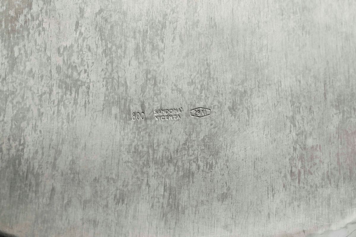 Dodici Sottopiatti in Argento. Argenteria Veneta del XX Swecolo. Argentiere Sandonà, Vicenza