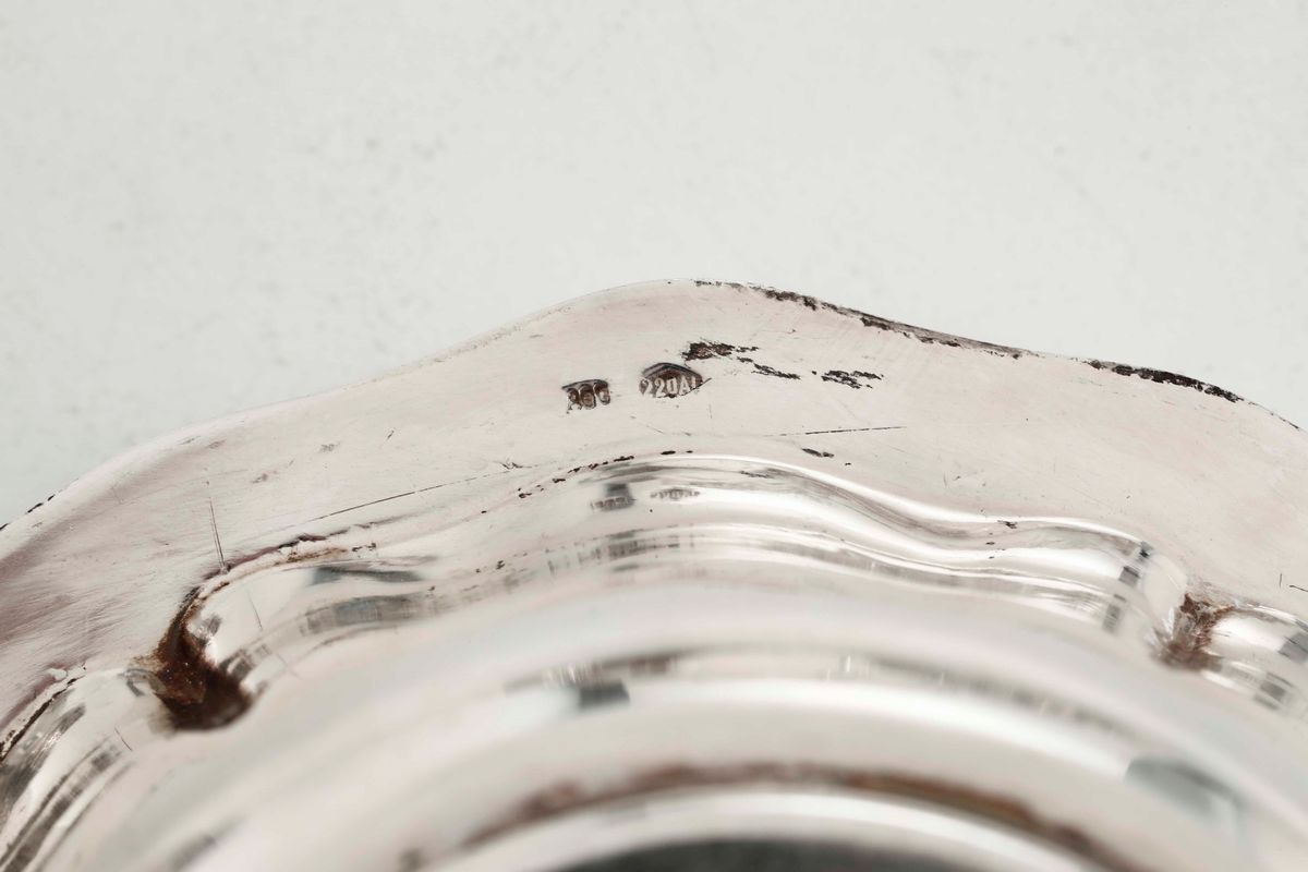 Ventiquattro Piattini e Due Serie di Diciotto Vaschette in Argento. Argenteria Italiana del XX Se...
