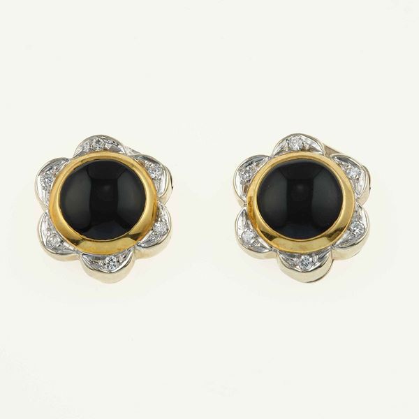Pair of onyx, diamond and gold button covers