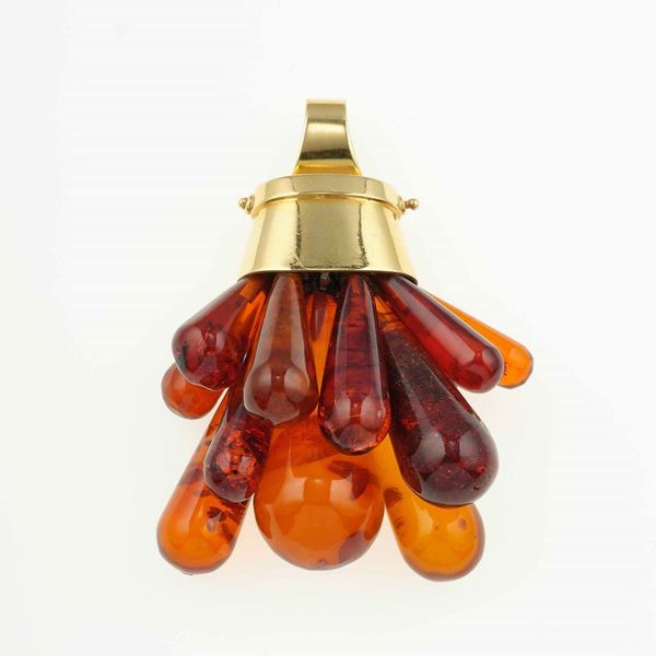 Amber and gold pendent