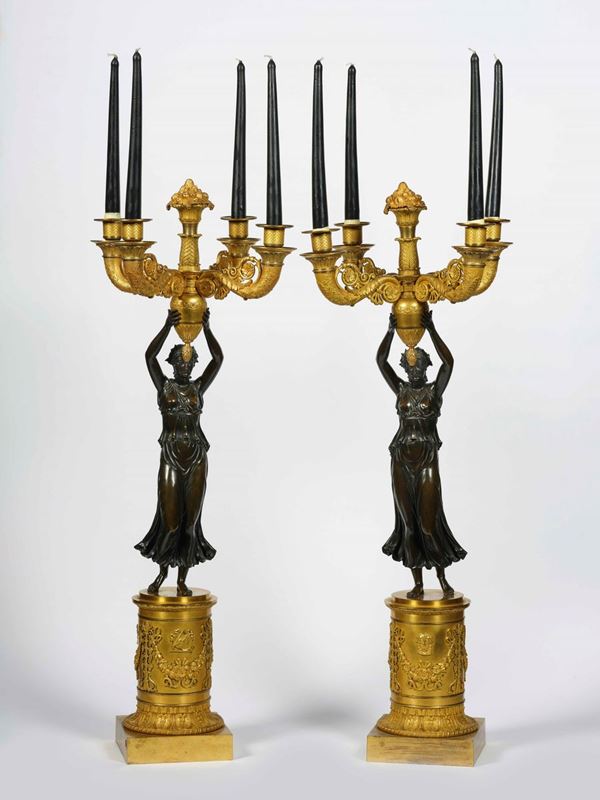Coppia di candelabri. Bronzo cesellato, dorato e patinato. Attribuiti a Pierre-Philippe Thomire (Parigi 1751 - 1843). Francia inizio XIX secolo