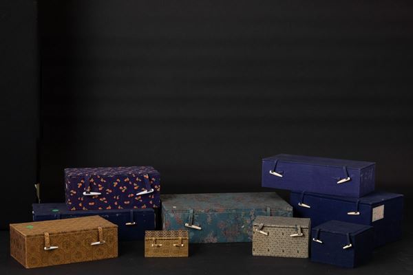 Lotto composto da nove scatole con rivestimento in tessuto, Cina, XX secolo