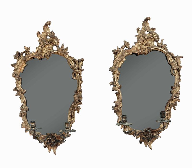 Coppia di specchiere in legno intagliato e dorato. Veneto, XIX-XX secolo  - Auction Italian Mansions - I - Cambi Casa d'Aste