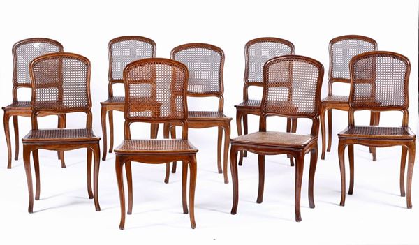 Gruppo di nove sedie in legno intagliato. XIX - XX secolo