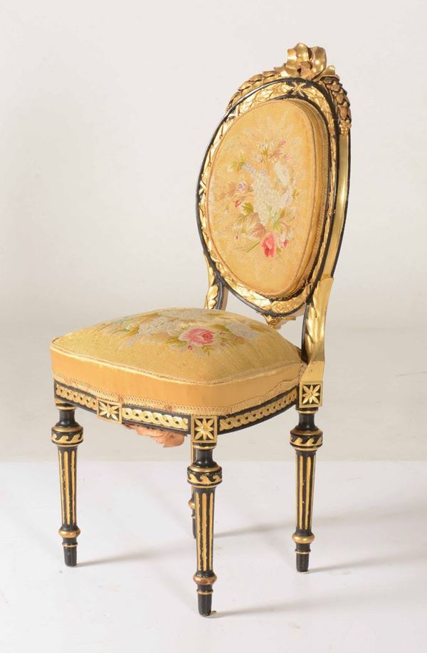Sedia Napoleone III in legno intagliato, dorato ed ebanizzato. XIX secolo