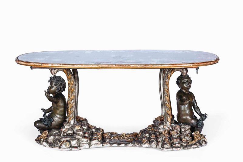 Tavolo in legno intagliato, dorato con putti in bronzo patinato. XX secolo  - Asta Dimore Italiane - Cambi Casa d'Aste