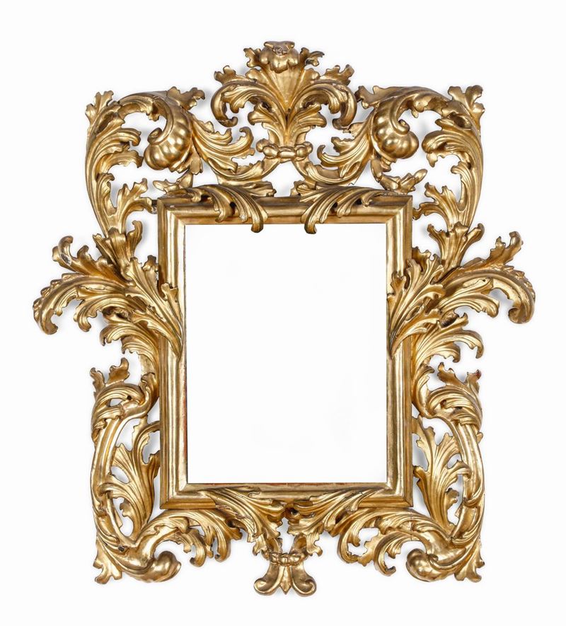 Specchiera in legno intagliato a motivi fogliacei e dorato , Italia XVIII secolo  - Asta Cornici Antiche - Cambi Casa d'Aste