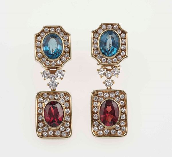 Pair of diamond, blue topaz and garnet earrings
