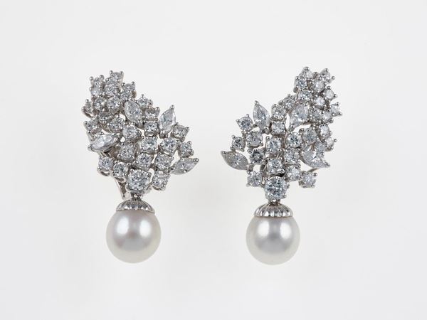 Pair of cutured pearl and diamond earrings