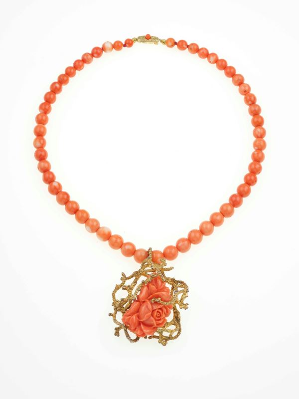 Coral neclace with carved pendant