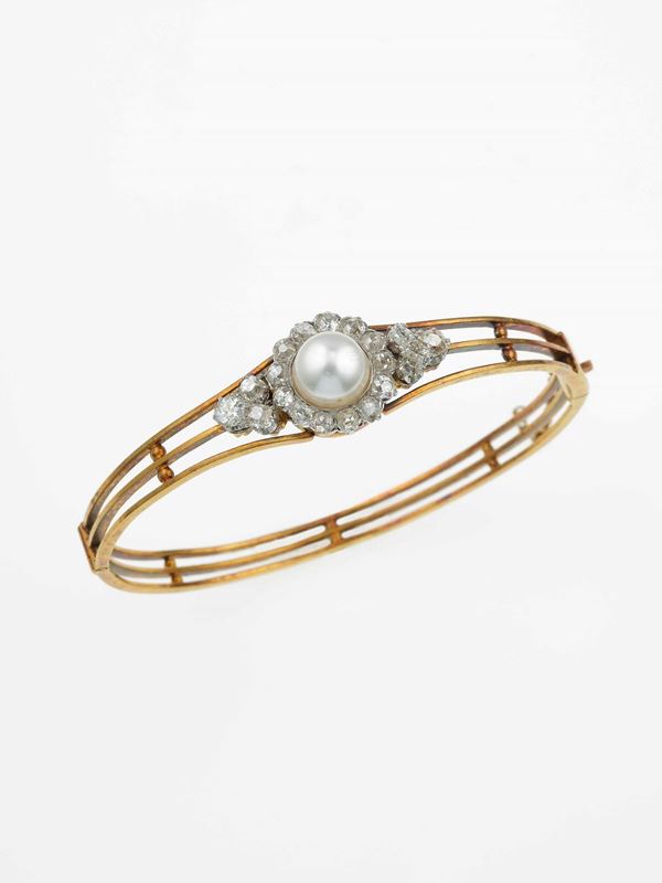 Natural pearl and gold bangle; accompanied by a gemmological report