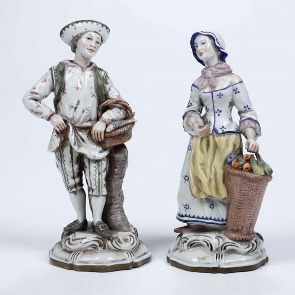 Coppia di figurine di venditori ambulanti, XX secolo