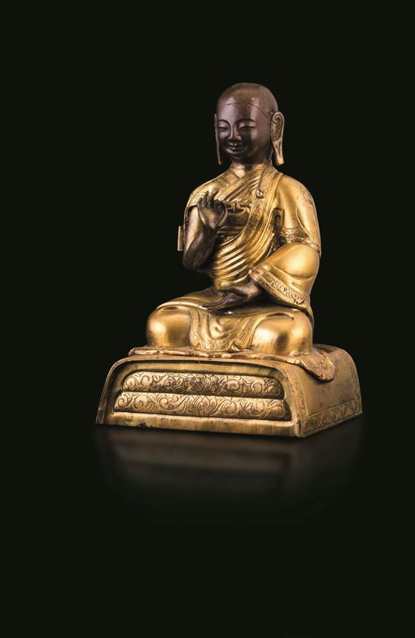 Figura di monaco in bronzo dorato, Tibet, XIX secolo