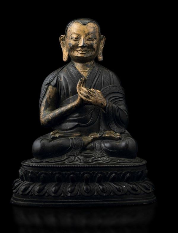 A bronze figure, Tibet, 1700s Partially gilt bronze