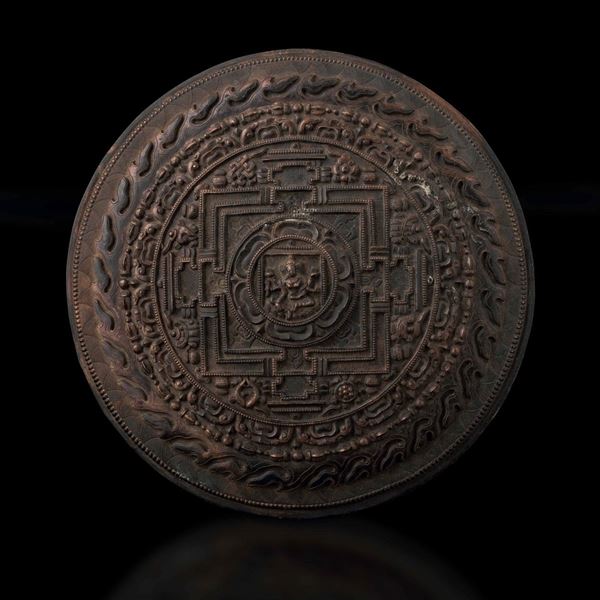 A bronze mirror plaque, Tibet, 1700s