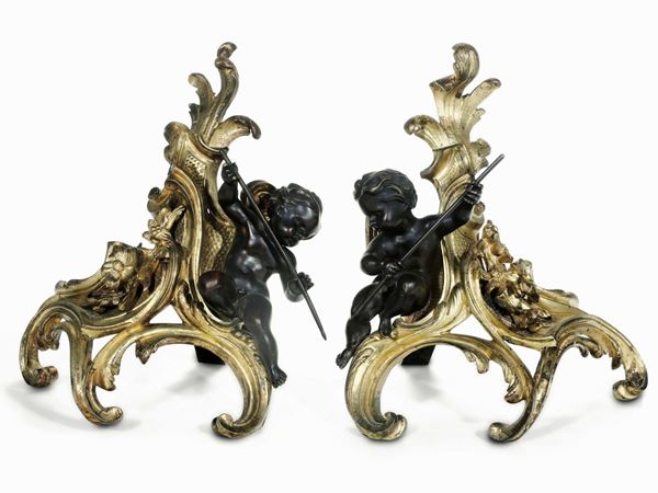 Coppia di alari in bronzo fuso, cesellato, dorato e patinato. Francia XVIII-XIX secolo