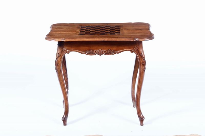 Tavolo da gioco in noce intagliato e intarsiato. XIX secolo  - Auction Italian Mansions - Cambi Casa d'Aste