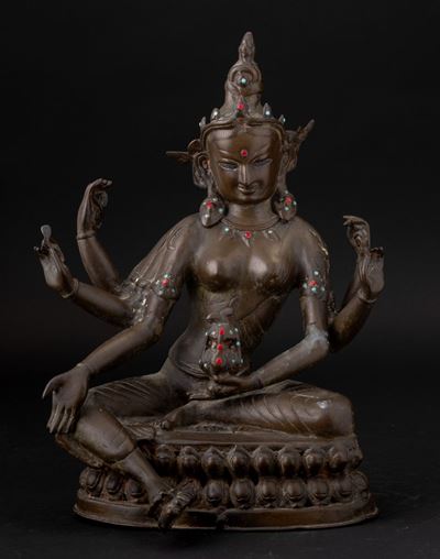 Figura di Tara Seduta su Doppio Fiore di Loto in Bronzo con Innesti in Turchese e Corallo, Tibet,...