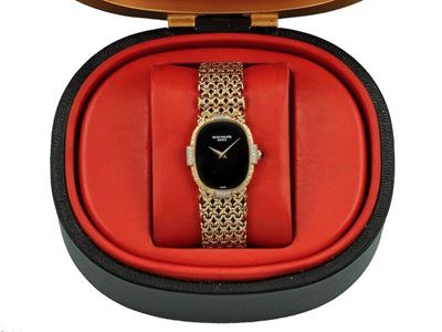 Patek Philippe Ellipse. Orologio da Polso per Signora, Quadrante in Onice e Piccoli Diamanti