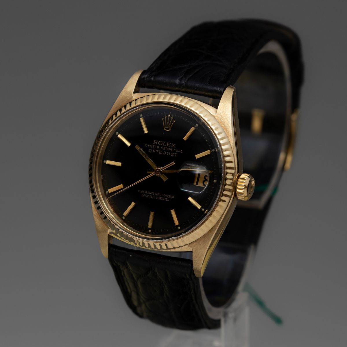 Rolex - Datejust Ref 1601 in Oro 18k con Quadrante Nero Indici a Bastone e Cinturino in Pelle.