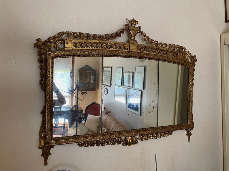 Specchiera in legno intagliato e dorato. XX secolo  - Auction Italian Mansions - Cambi Casa d'Aste