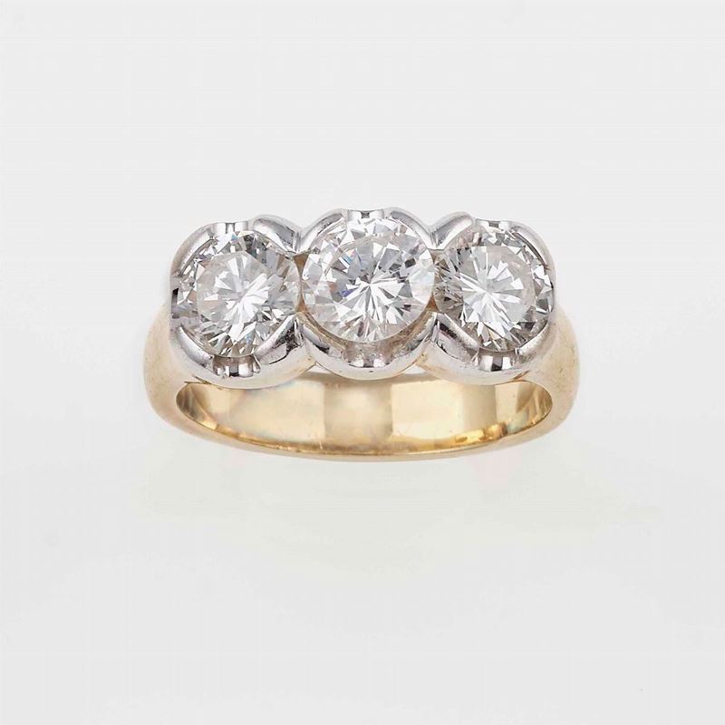 Anello con tre diamanti taglio brillante per ct 2.40 circa totali  - Asta Fine and Coral Jewels - Cambi Casa d'Aste